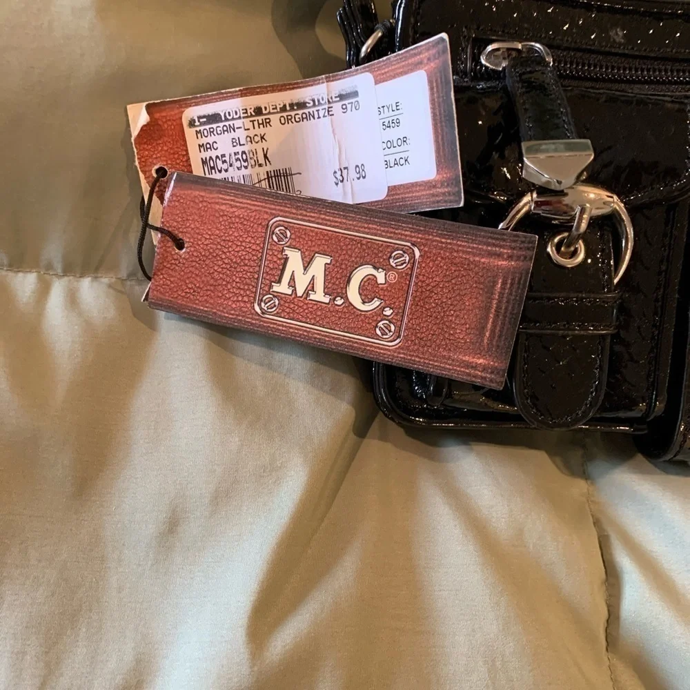 M.C. black patent